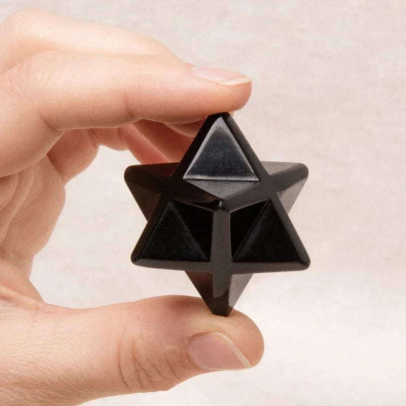 Black Obsidian Merkaba showing its geometric shape and smooth volcanic glass texture